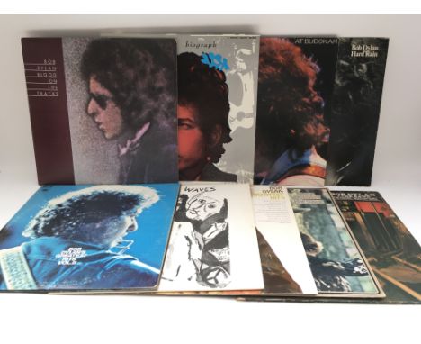 Two bags of 18 Bob Dylan LPs comprising 'Blood On The Tracks', a 5LP 'Biograph' box set, 'Desire' and others.