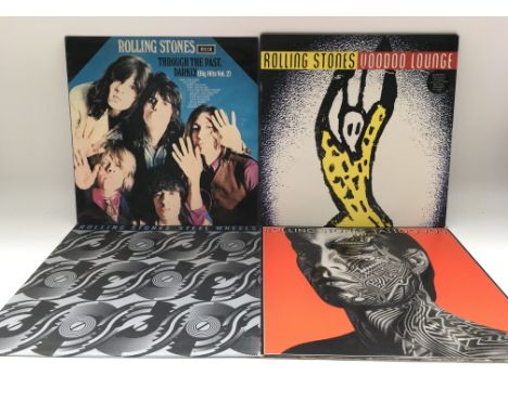 Four Rolling Stones LPs comprising 'Voodoo Lounge', 'Steel Wheels', 'Tattoo You' and 'Through The Past, Darkly'.