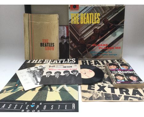 A collection of Beatles ephemera including a 1963 Beatles show tour program (the cover has separated from the rest of the boo