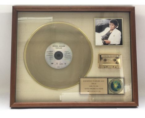 A framed and glazed limited edition gold disc, CD and cassette display in recognition for worldwide sales of the Thriller alb