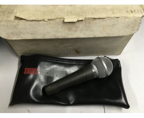 A boxed Shure SM58 microphone.