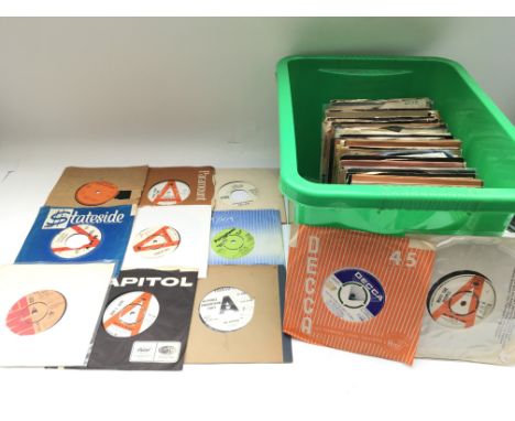 A collection of promotional discs and acetates by various artists including The Rolling Stones, Sam Cooke, The Clash, Queen a