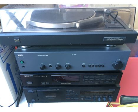A Dual CS 505-4 turntable, NAD 302 amplifier, Pioneer F-401L digital tuner and a Yamaha KX-260 cassette deck (4).