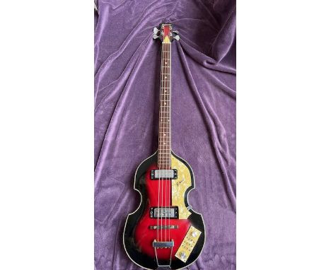 A Sekova Lawsuit era Japanese manufactured bass guitar designed to be a replica of a Hofner Beatle Bass. Average condition wi