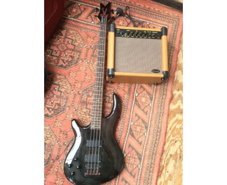 A Dean left handed bass guitar with soft carry case and an Eastcoast practice amp (2).