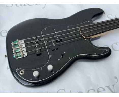 A 2014 Fender USA Tony Franklin Fretless Precision Bass Guitar in unplayed near-mint condition. Comes with all original parts