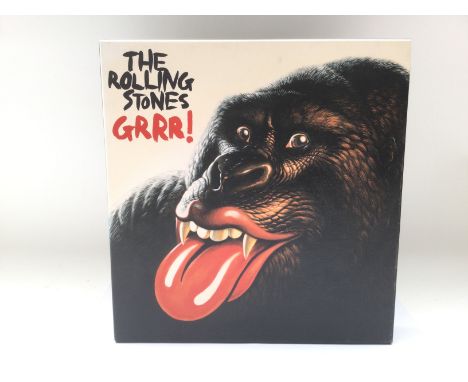 A limited edition and numbered Rolling Stones 'Grrr!' 5LP box set and book.