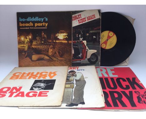 A box of rock n roll and blues LPs, EPs and 7" singles by various artists including Bo Diddley, Chuck Berry, Eddie Cochran, B