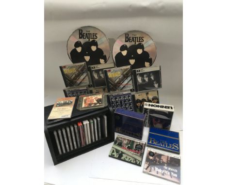 Three Beatles retail displays for CDs plus a Beatles CD bread bin (incomplete) and other CD sets.