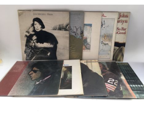 Two bags of 20 folk rock LPS by various artists including Bob Dylan, Joni Mitchell, Neil Young and others.