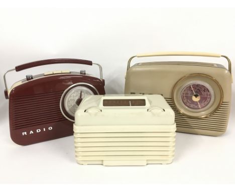 Five vintage and modern radios including Bush and Champion examples.