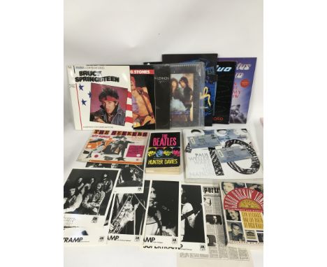 A box of music memorabilia comprising tour programs for Paul Weller (with tickets), Bruce Springsteen and others plus a Pink 