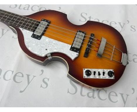 A Hofner B-Bass "Beatle Style" Hi Series Bass Guitar in sunburst finish. Very good unplayed condition with stickers still on 