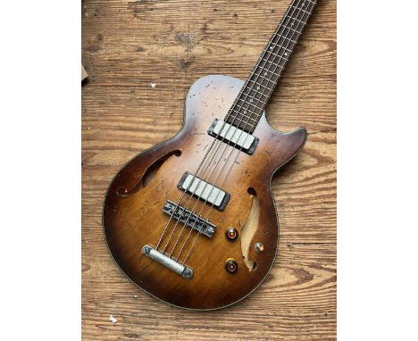 An Ibanez Artcore 5 String Bass Guitar with distinctive Ibanez finish in non original case - condition very good.