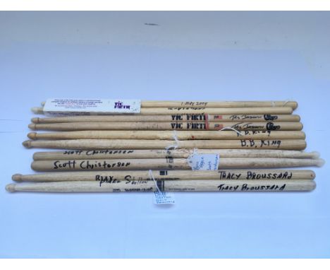 A collection of stage used drumsticks, various artists including BB King, Tris Imboden (Chicago), Buster Marberry (The Tempta