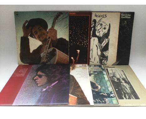 Eight Bob Dylan LPs comprising 'Nashville Skyline', 'Blood On The Tracks', 'Planet Waves' and others.