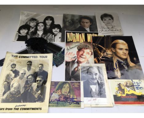 A box of music, TV and film memorabilia comprising various autographs, publicity prints, Avengers action figures, film cels e