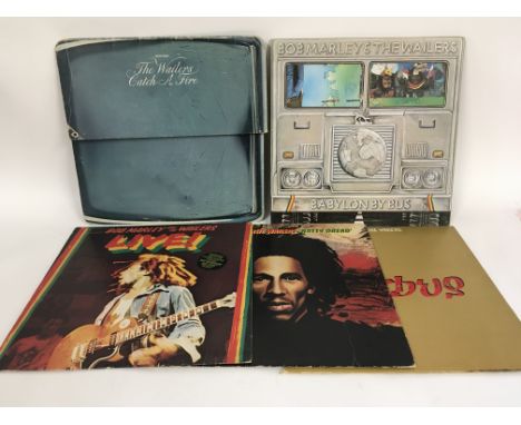 Five Bob Marley LPs including 'Catch A Fire' with zippo sleeve (loose), 'Babylon By Bus' and others.