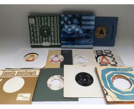 A collection of promo discs, a Pink Floyd 7" single of 'Arnold Layne', a Bob Dylan 7" singles box set, a sealed RSD 7" single