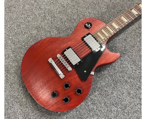 A 2009 Gibson Les Paul Studio electric guitar in natural mahogany finish, all original and in very good largely unplayed cond