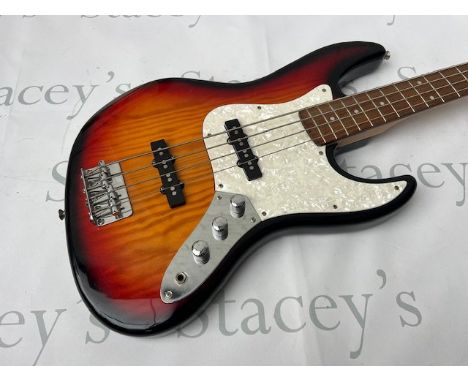 An Antoria (modern era) J Bass replica Bass Guitar in sunburst with chrome parts and pearloid pick guard. Overall unplayed co