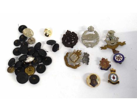 Small quantity of 20th century British cap badges, buttons and brooches to include 23 black Bakelite Royal Norfolk Regt butto