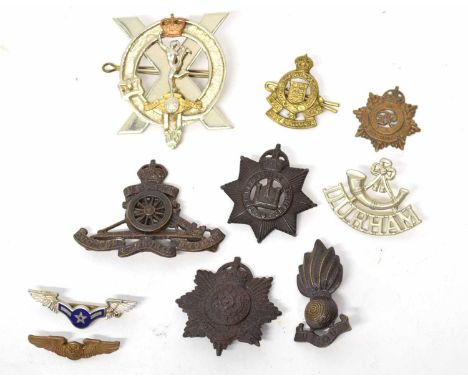 Small quantity of 20th century British military cap badges to include Royal Artillery, Hampshire Regt, Royal Army Service Cor