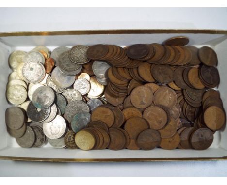 A quantity of UK and foreign coins pre and post decimal