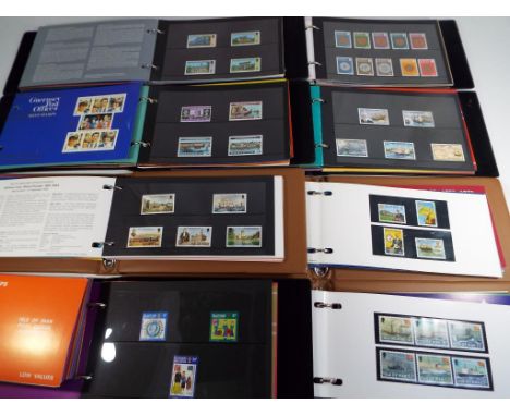 Deltiology - a good collection of mint stamps to include four books from States of Guernsey Post Office with collections to i
