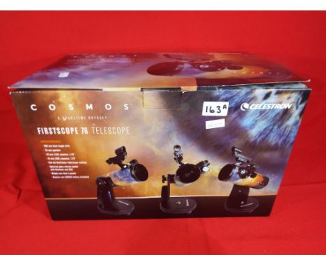 A Cosmos Time Odyssey First Scope model 76 telescope by Celestron with instructions and original box