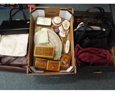 A good lot to include a vintage dressing-table set, four wooden trinket boxes and a quantity of vintage leather handbags to i