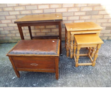 A vintage sewing lift-up lidded table containing sewing accessories, included in the lot is a fold-over card table and a nest