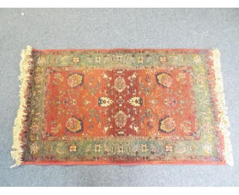 A good good quality carpet / rug measuring approx 80cm x 140cm