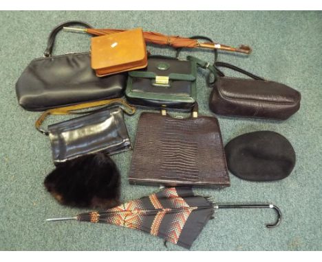 A good collection of good quality ladies handbags, two vintage umbrellas and other