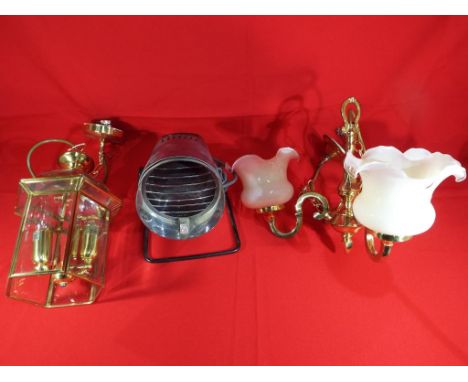 A good lot to include a three arm chandelier, a lantern style ceiling light and a vintage Philips heat lamp model KL7500
