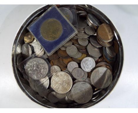 A large quantity of UK and foreign coins to include Royal Commemorative, pre and post decimal coins and a 1980 Moscow Olympic