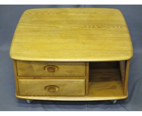 MID-CENTURY ERCOL LIGHT ELM TWO DRAWER SQUARE COFFEE TABLE on castors, 39.5cms H, 80 x 80cms top