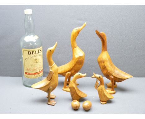 TREEN DUCK ORNAMENTS and an oversized Bells Old Scotch Whisky bottle