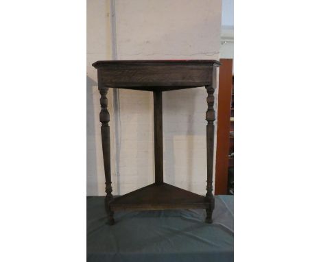 A Late 19th Century Oak Corner Stand with Turned Supports and Stretcher Shelf, 81cm Wide and 102cm High 