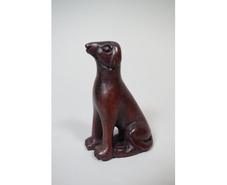 A Carved Wooden Netsuke of a Hound, 7.5cm High 