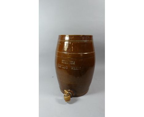 A Treacle Glazed Stoneware Barrel. 'Etherium Drinking Water' with Ceramic Tap, 4 Gallon, 43cm High 