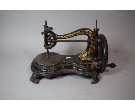 A Vintage Gilt Decorated Sewing Machine 