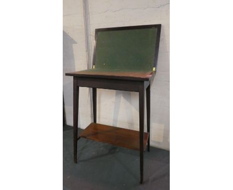 An Edwardian Mahogany Lift and Twist Top Games Table with Beize Playing Surface and Stretcher Shelf, 55cm Wide 