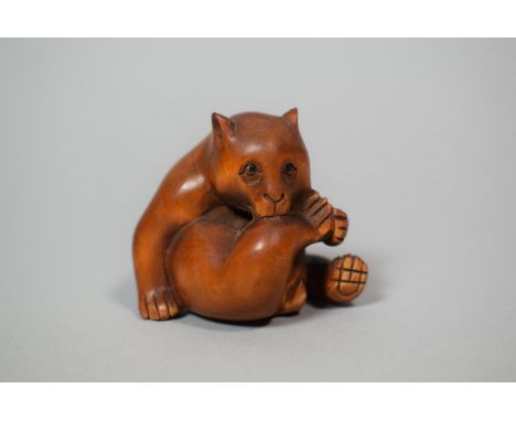 A Japanese Carved Wooden Netsuke of a Bear, Signed, 4.5cm High 