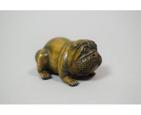 A Carved Wooden Netsuke in the form of a Bulldog, Signed, 4.5cm Wide x 3cm High 
