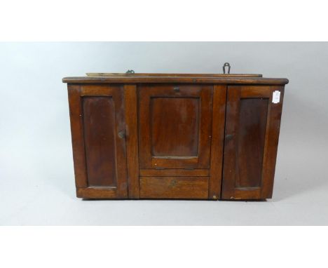 A Late 19th Century Wooden Spice Cabinet with Centre Pull Out Tea Caddy Store Over Small Drawer and Two Shelved Compartments 