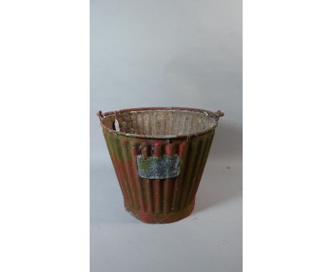 A Vintage Red Painted Ribbed Galvanised Fire Bucket by Four Oaks 
