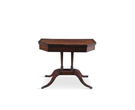 A GEORGE IV INLAID MAHOGANY HEXAGONAL FOLDING TOP CARD TABLE, the interior baise lined, with crossbanded top, the apron with 