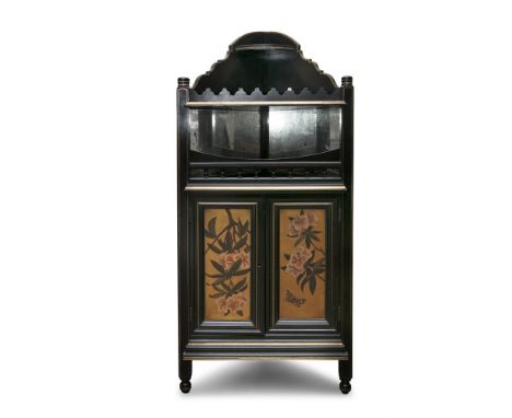 AN EBONISED, GILT AND FLORAL PAINTED CORNER CABINET, aesthetic period, the raised gallery back with small quadrant shelf, a m