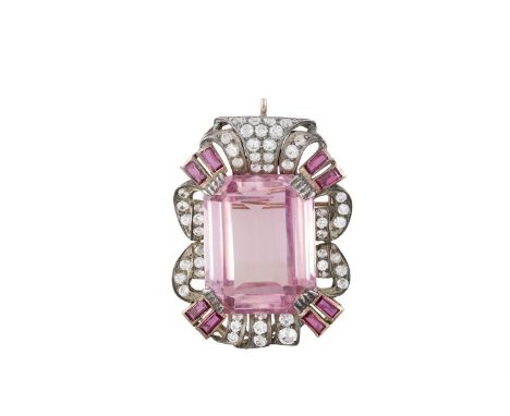 A VICTORIAN STYLE KUNZITE AND DIAMOND PENDANT/ BROOCH, the large rectangular step-cut kunzite (possibly synthetic) within a p